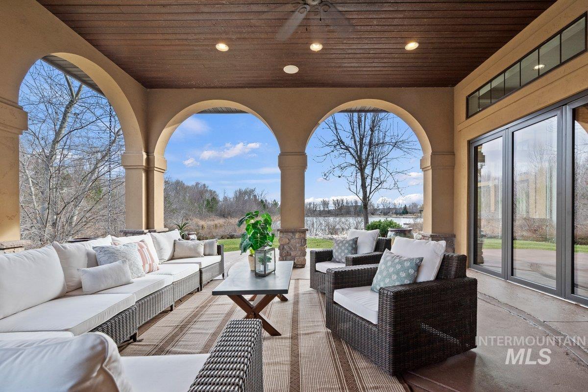 View of patio with an outdoor hangout area