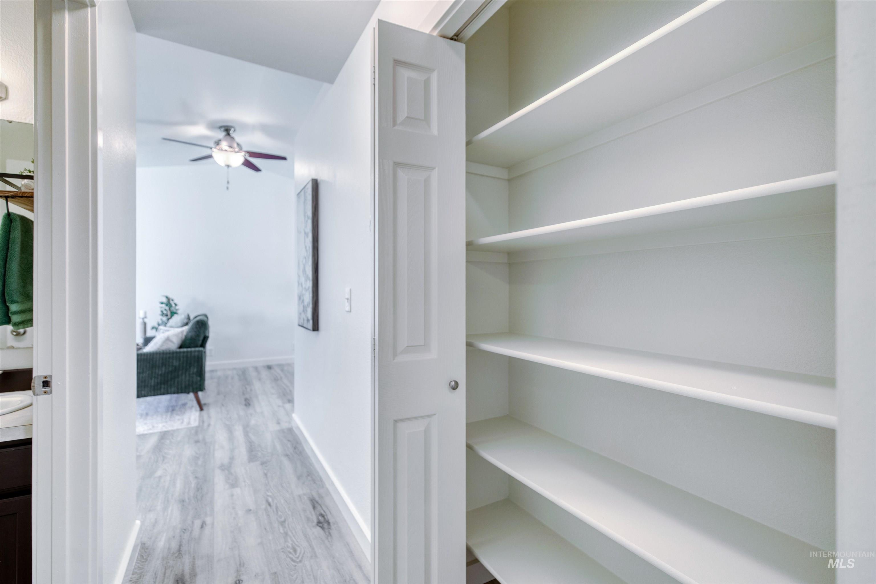 Integrated storage closet with multiple shelving units