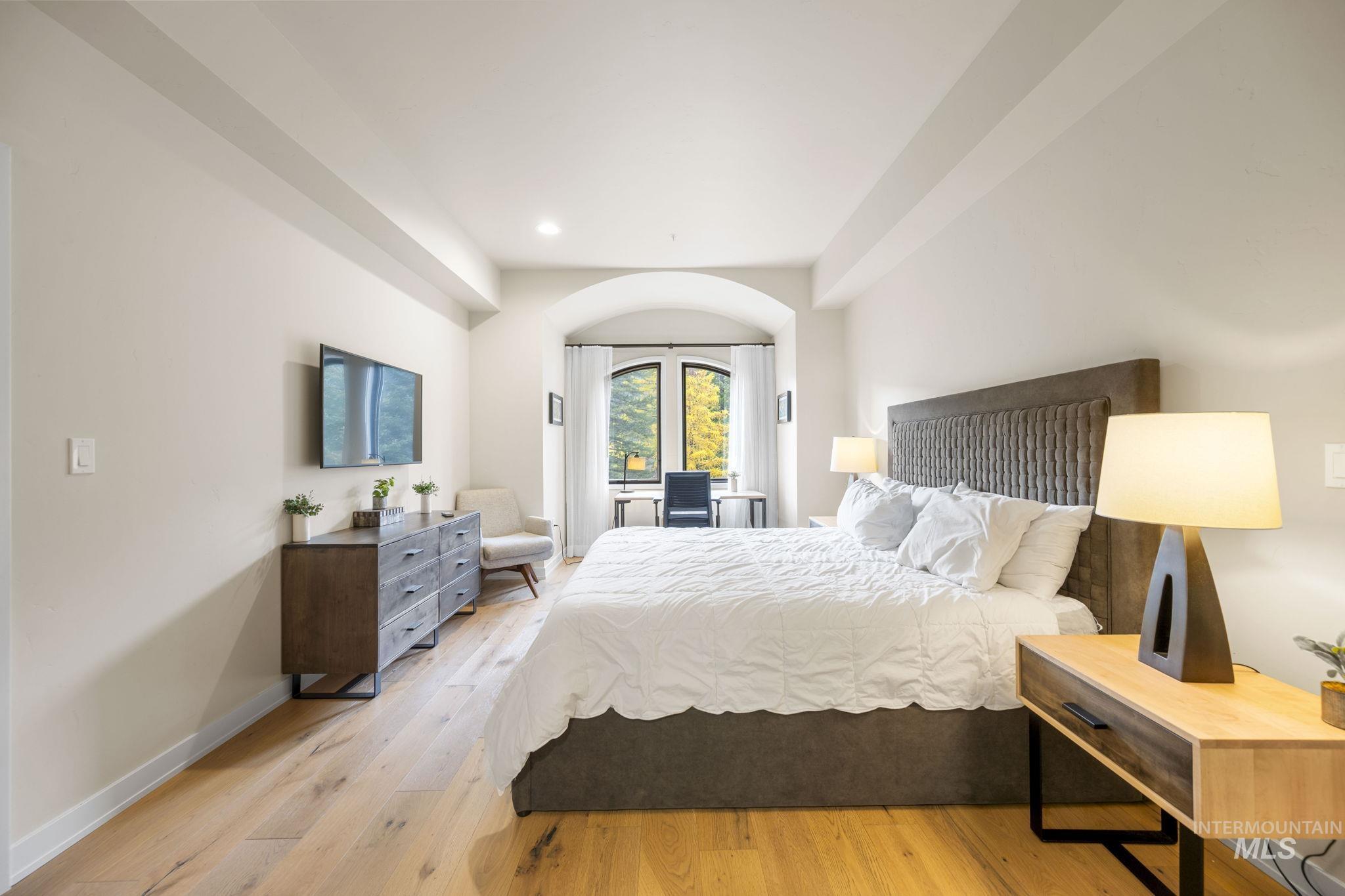 Bedroom featuring light wood-style flooring and recessed lighting