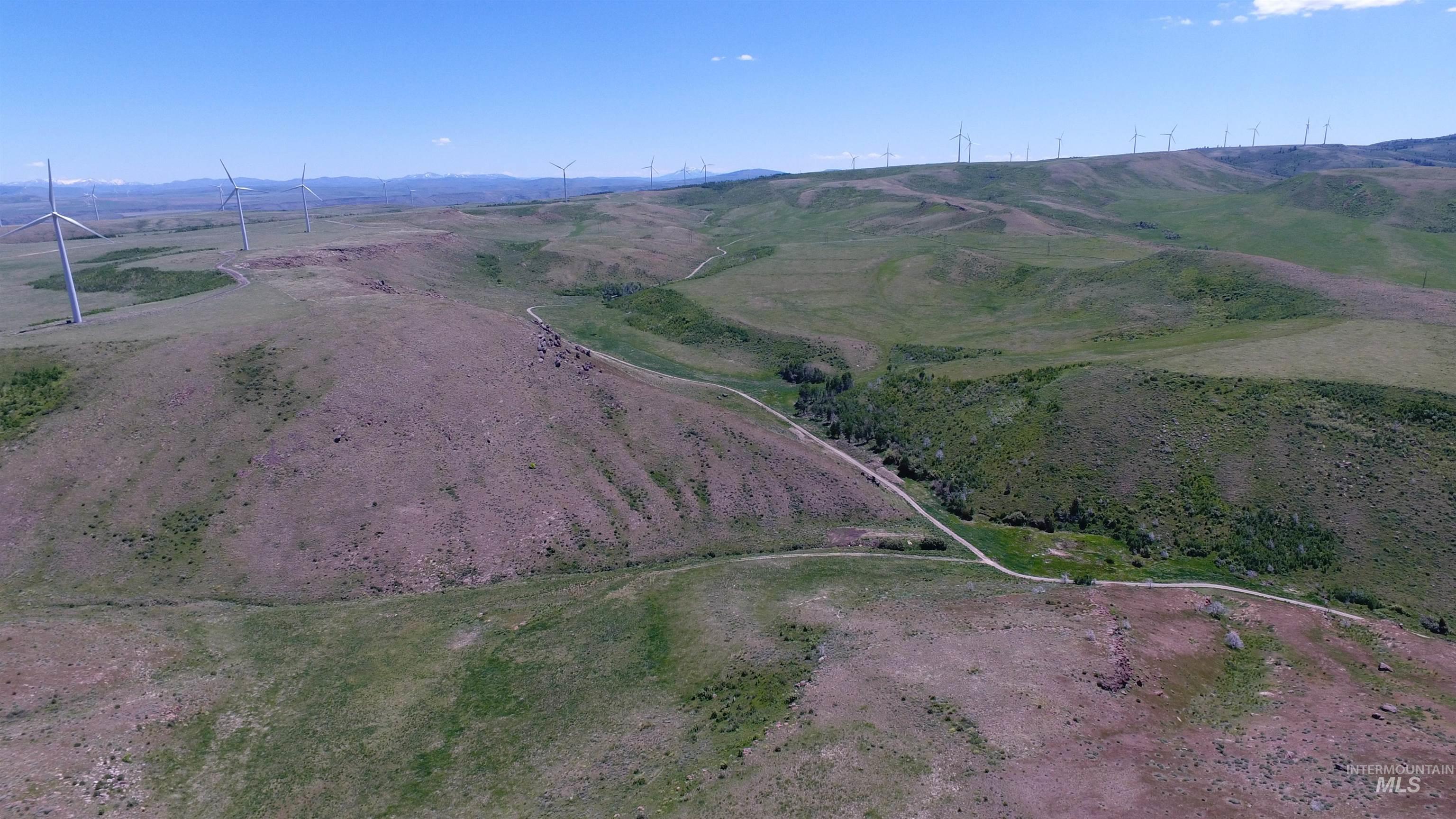 Drone / aerial view of a mountain backdrop