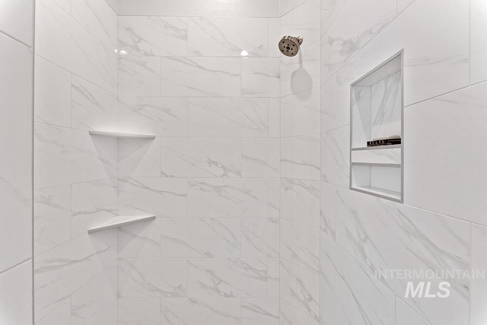 Bathroom view of tiled shower