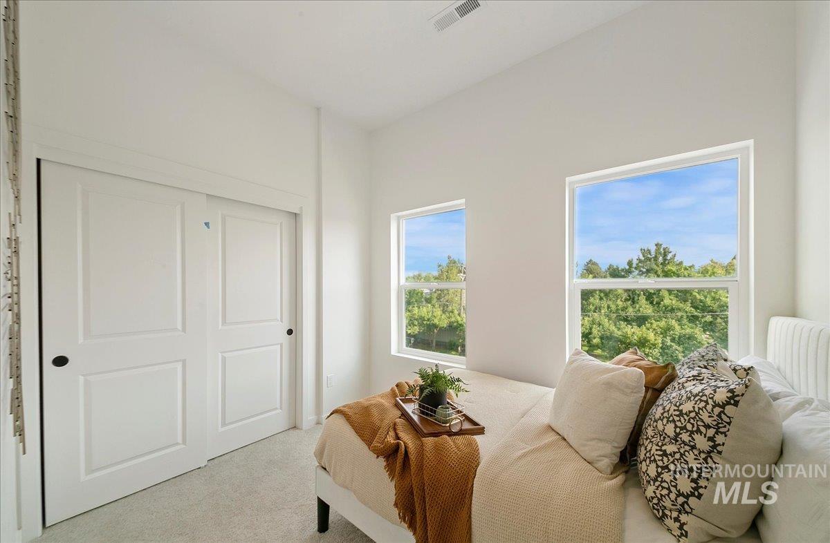 Bedroom featuring carpet