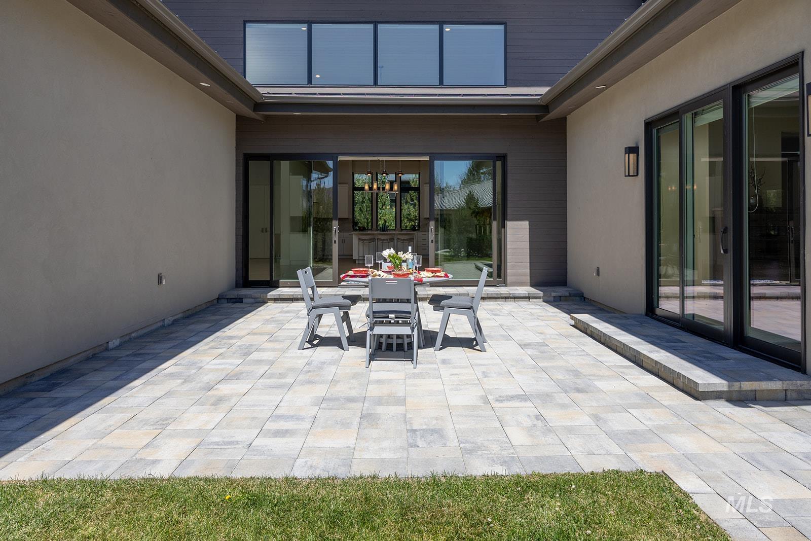 View of patio with outdoor dining space