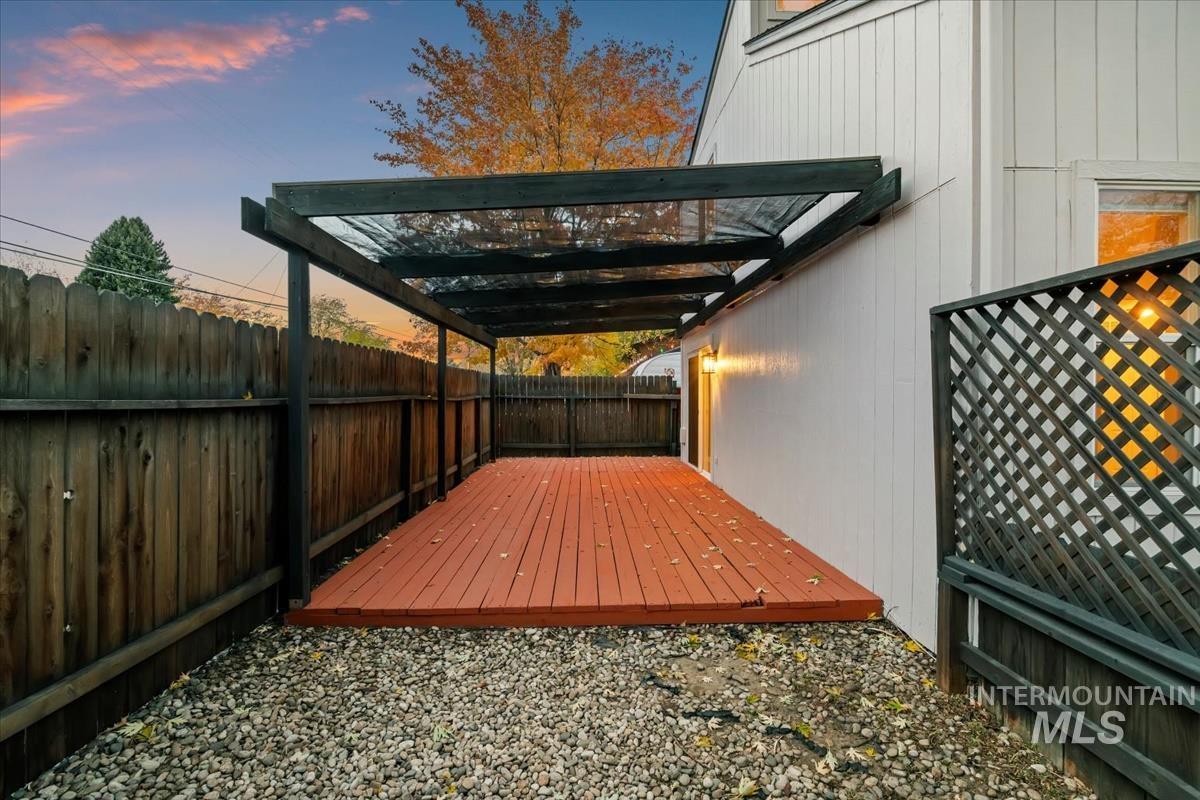 Deck featuring a fenced backyard