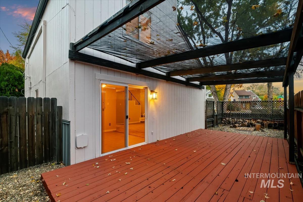 Deck with a fenced backyard