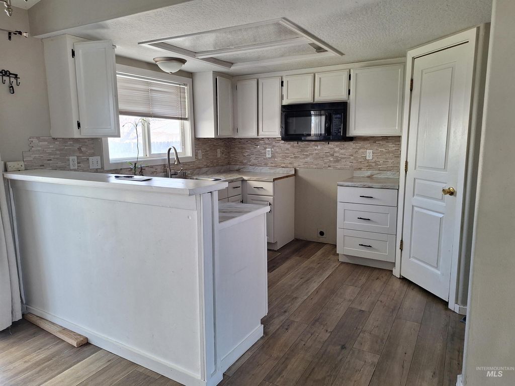 Photo of 601 Laster St, Caldwell, ID 83607 (MLS # 98970604)