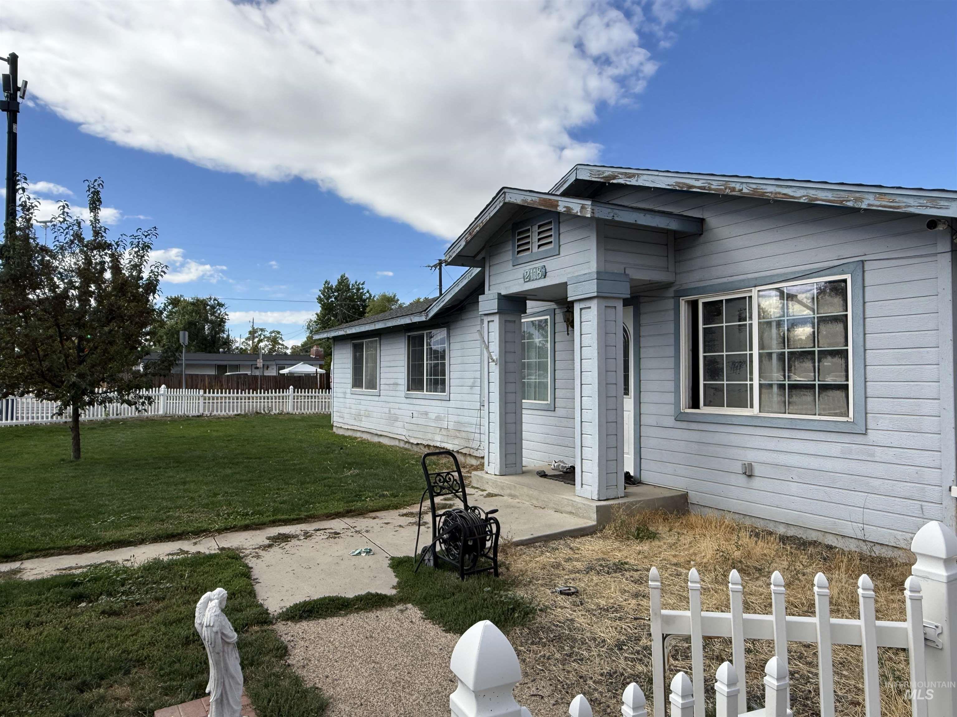 Back of property with a patio