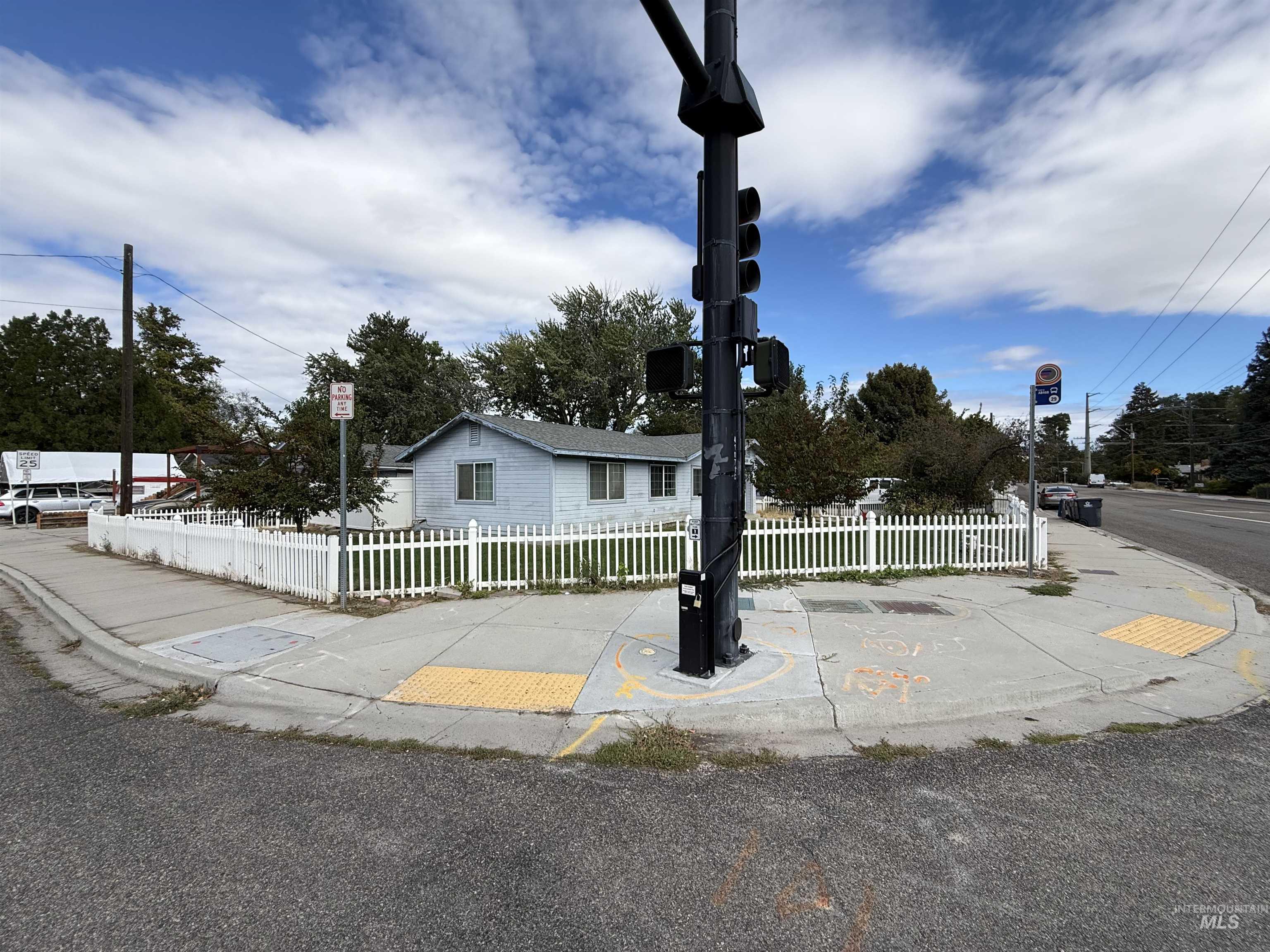 View of front of house featuring a fenced front yard