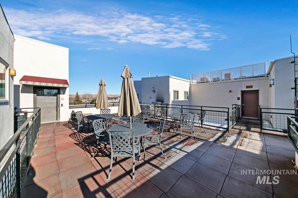 View of patio with outdoor dining space