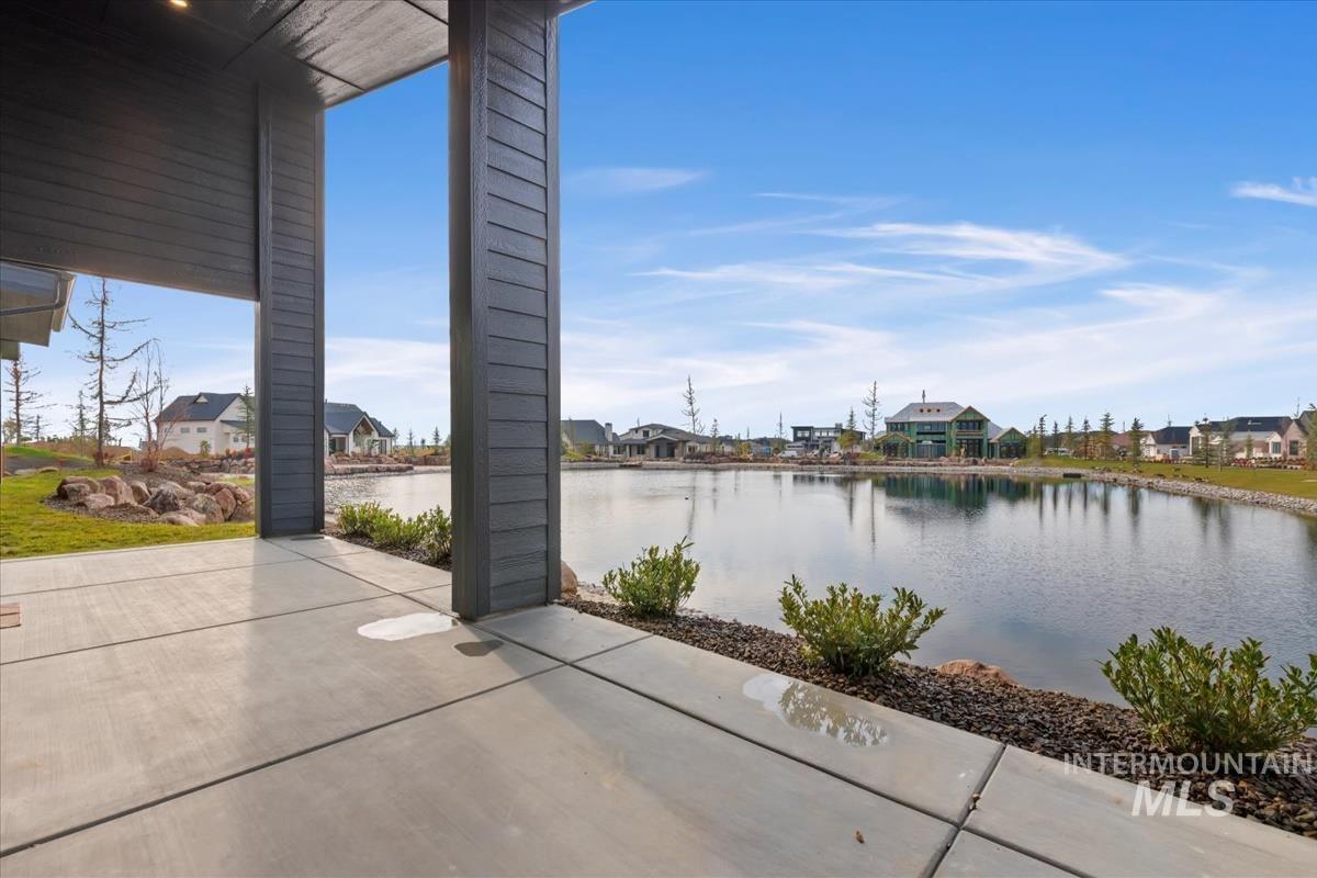 Water view featuring nearby suburban area