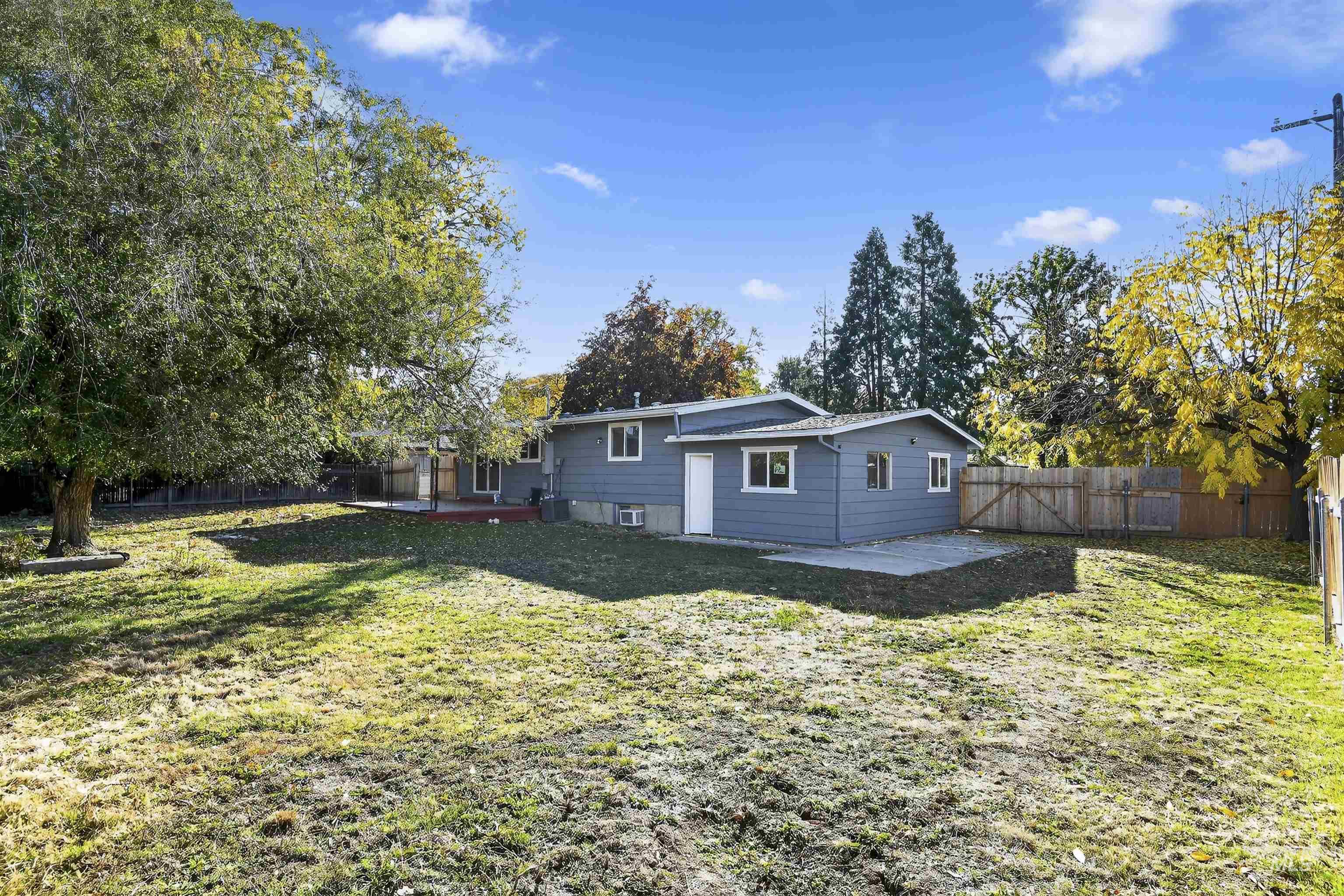Back of house featuring a patio and a fenced backyard
