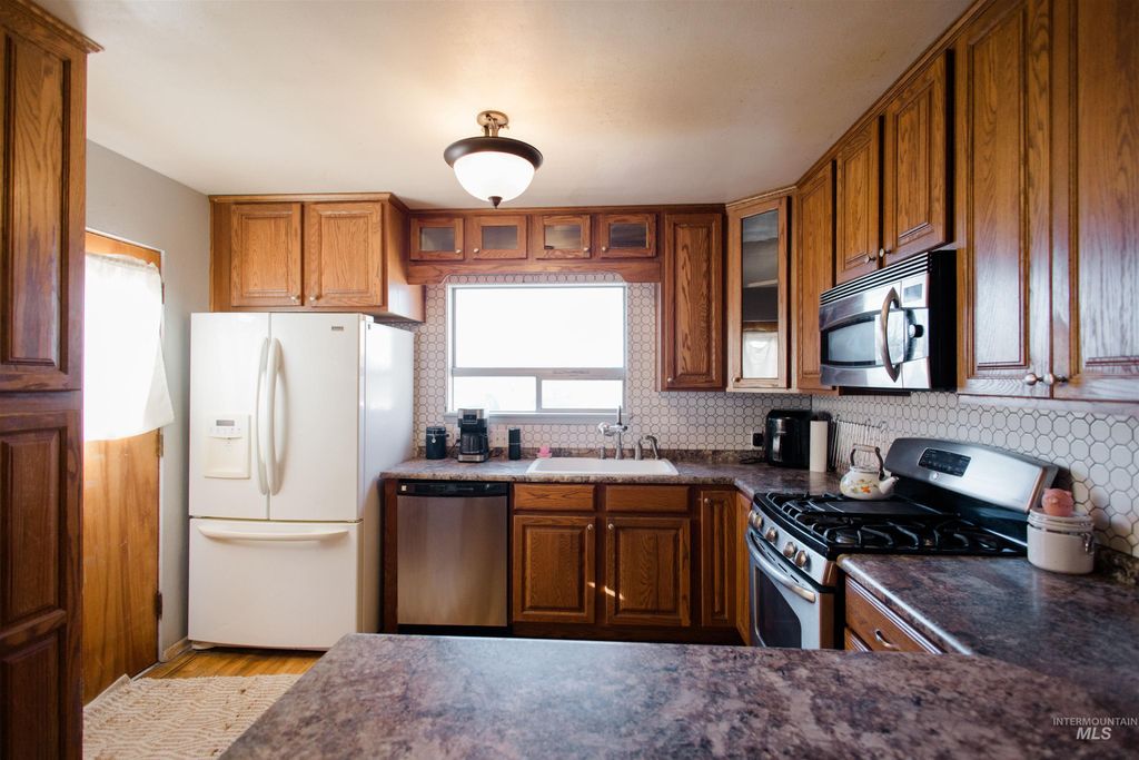 Photo of 875 N 8th E, Mountain Home, ID 83647 (MLS # 98969728)