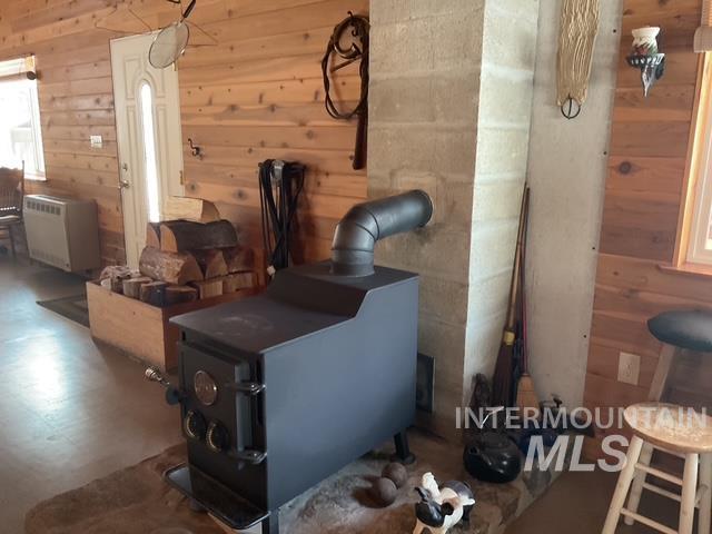 Utility room featuring heating unit