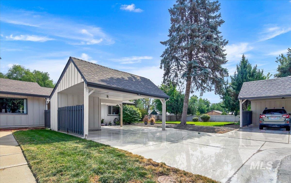 Surrounding community featuring a carport