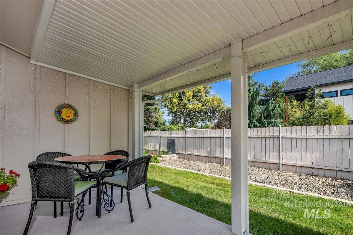 View of patio with outdoor dining area