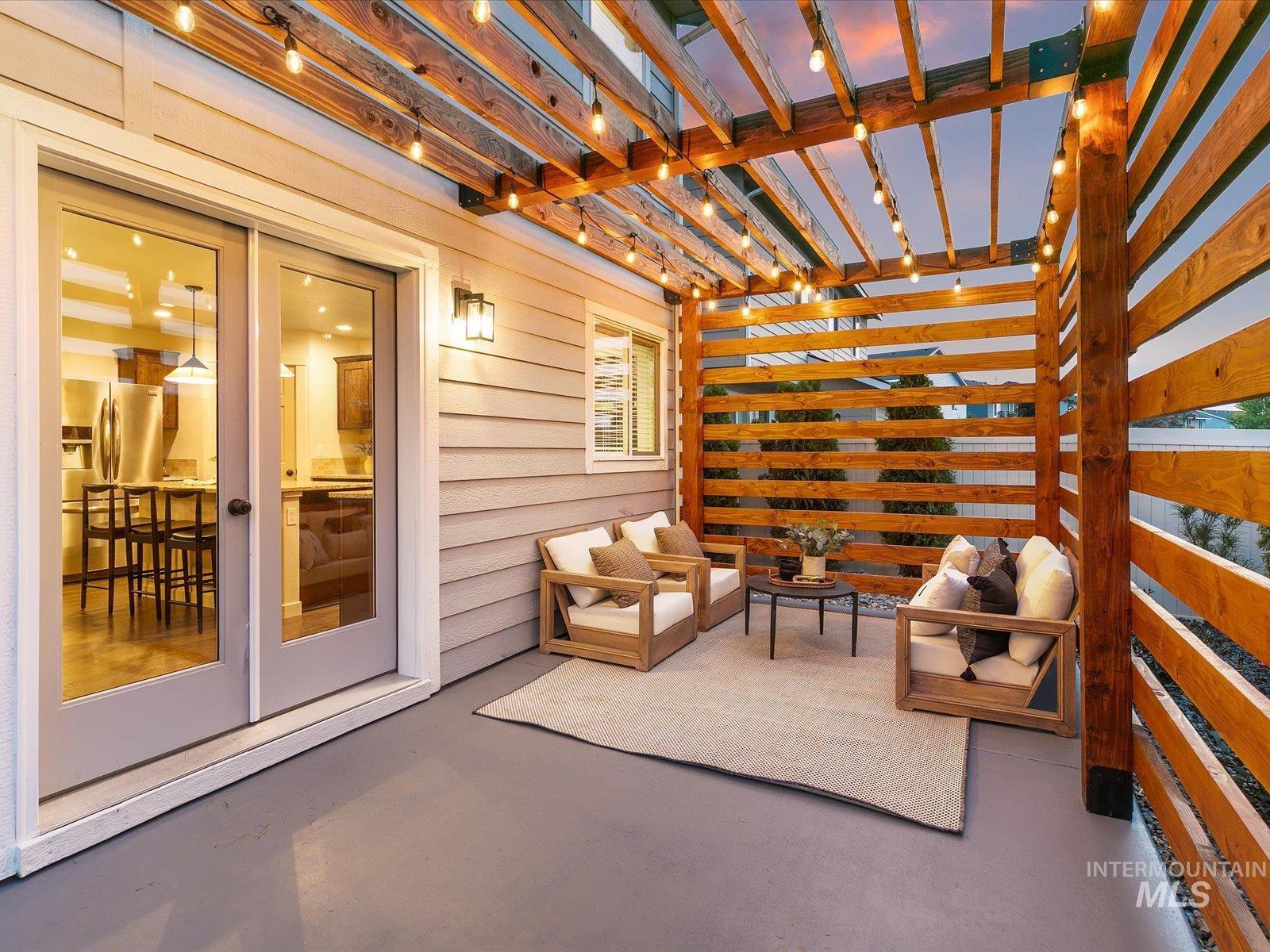 View of patio / terrace featuring an outdoor living space and a pergola