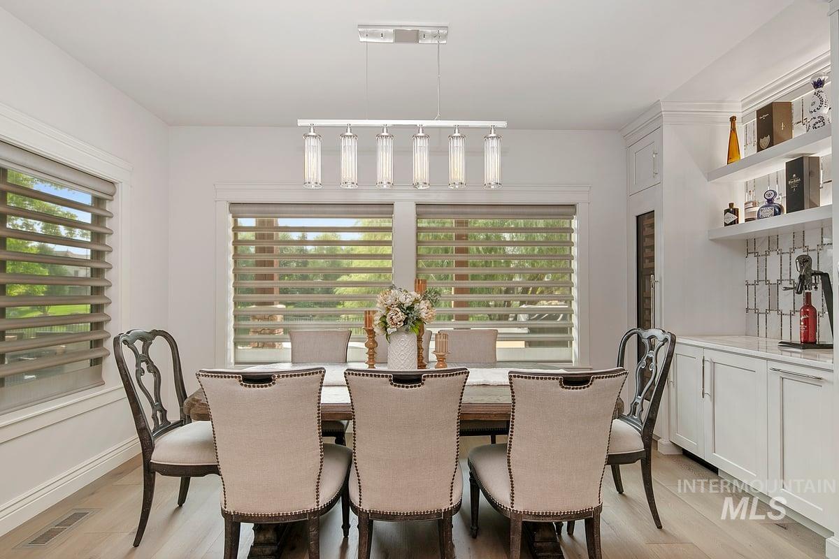 Dining room featuring light wood-style flooring