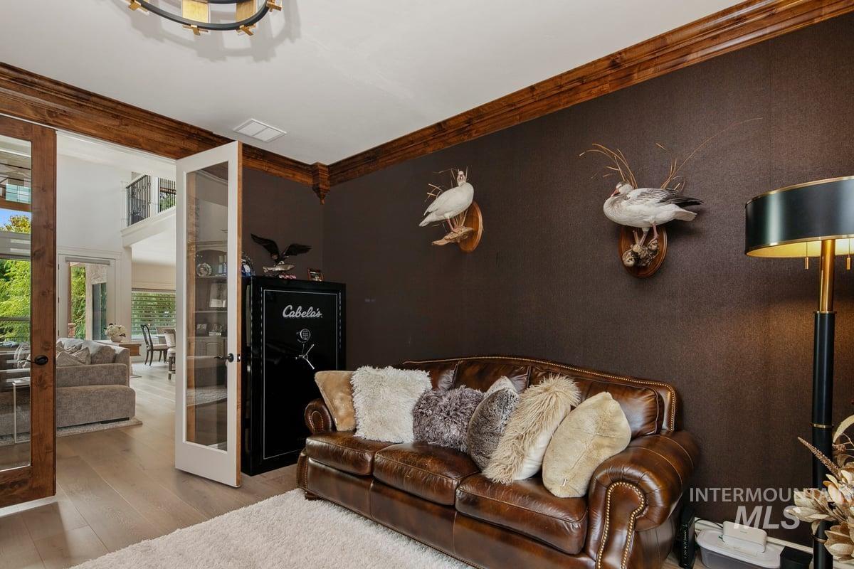 Living room featuring wood finished floors and french doors