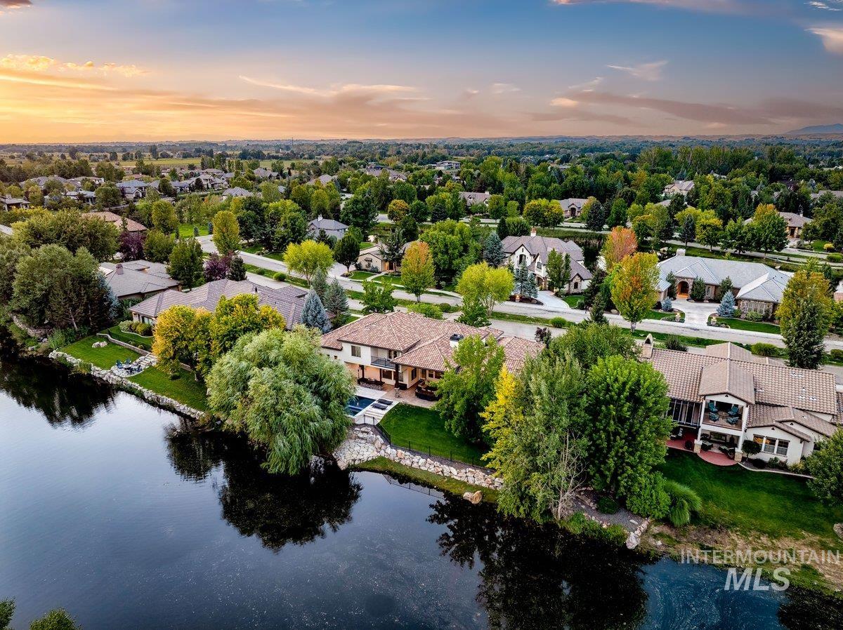 Aerial view at dusk of a residential view and a water view