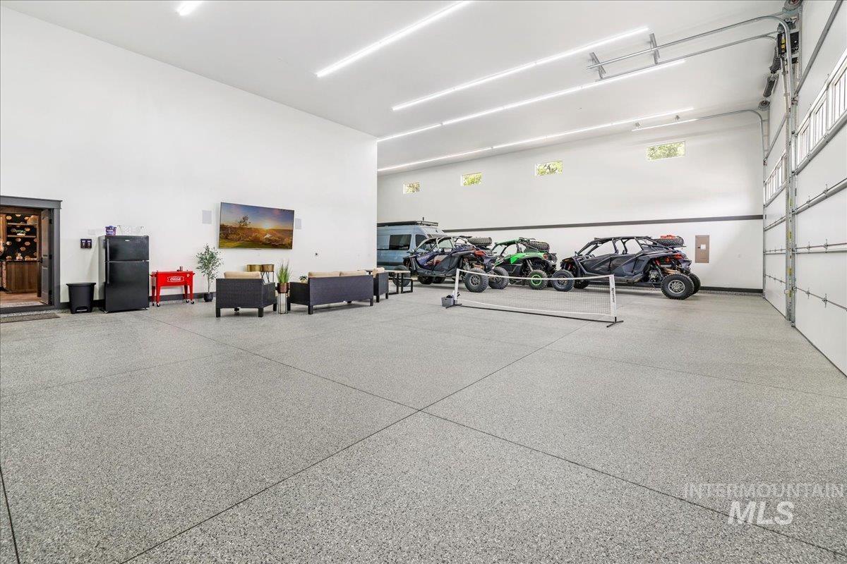 Garage with freestanding refrigerator