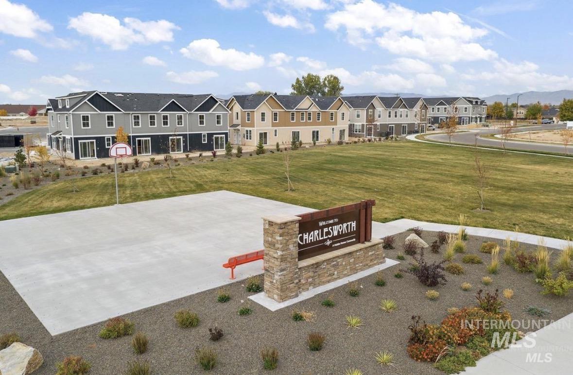 View of home's community with community basketball court and a residential view