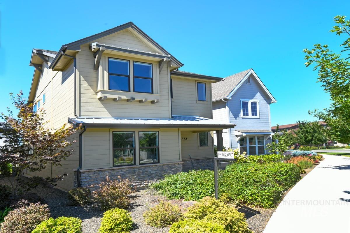 View of front facade with stone siding