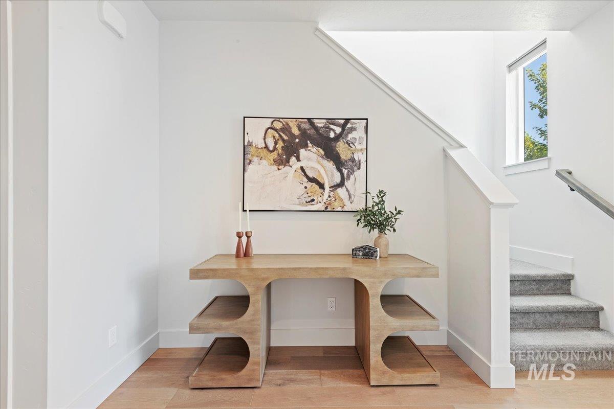 Office area with light wood-style flooring
