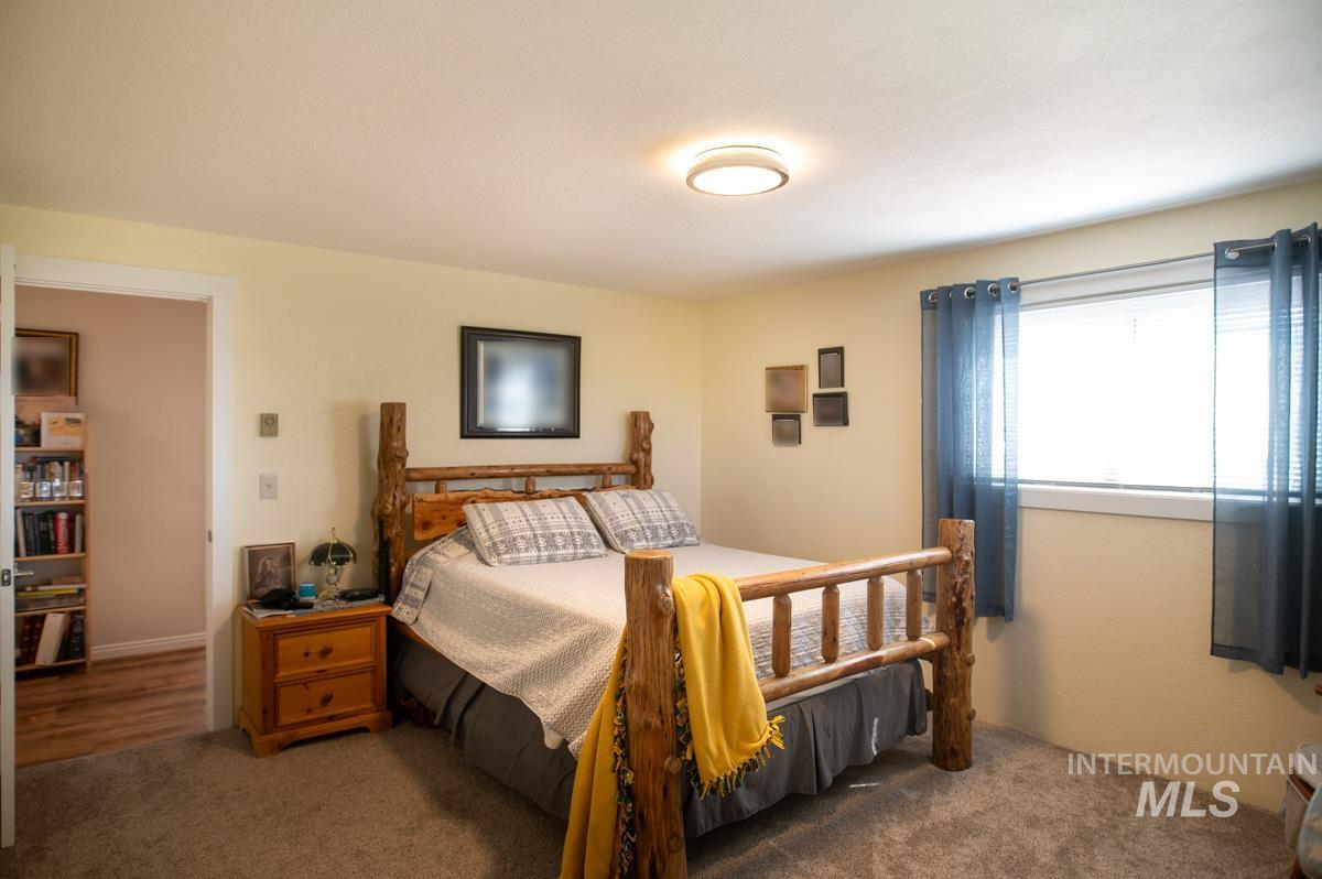 Bedroom featuring carpet flooring