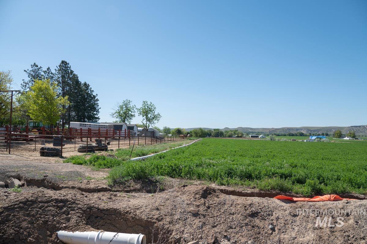 View of yard with a view of rural / pastoral area and an outbuilding