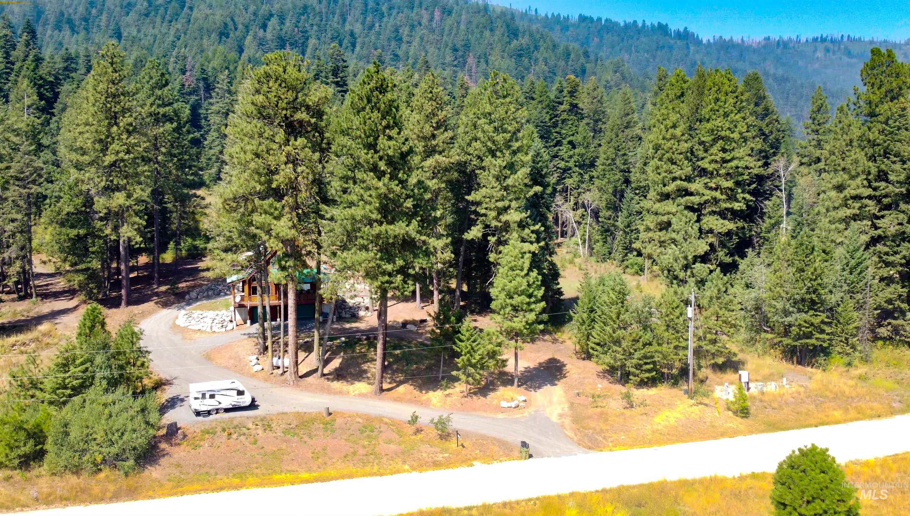 Drone / aerial view of a heavily wooded area