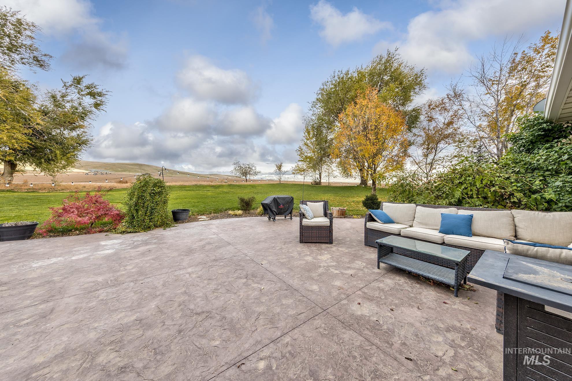 View of patio featuring an outdoor hangout area