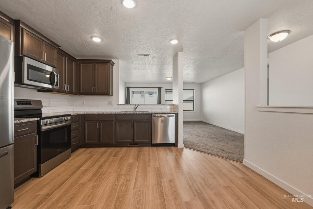 Photo of 12320 Shadow River St, Caldwell, ID 83607 (MLS # 98982461)