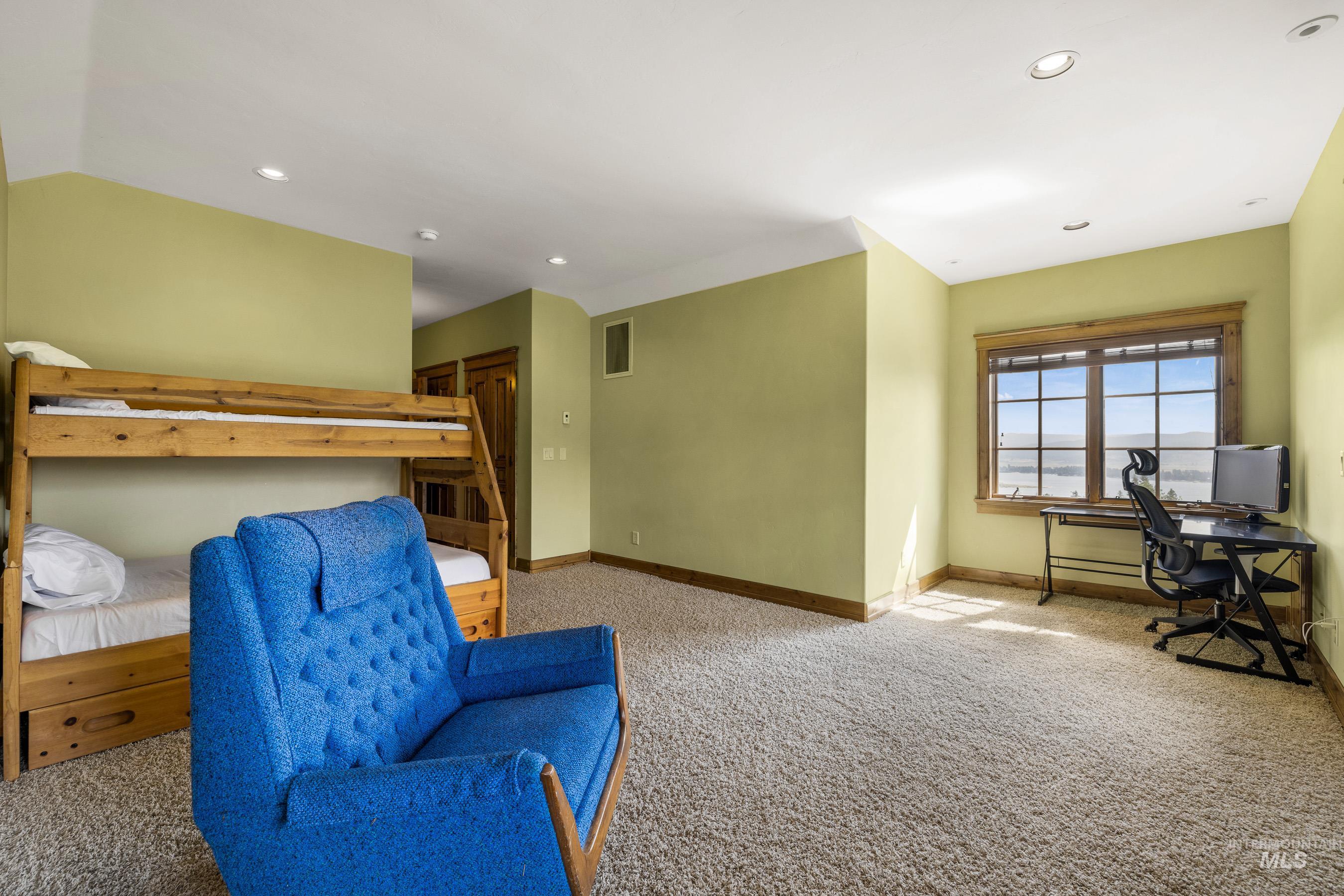 Bedroom with carpet, a desk, and recessed lighting