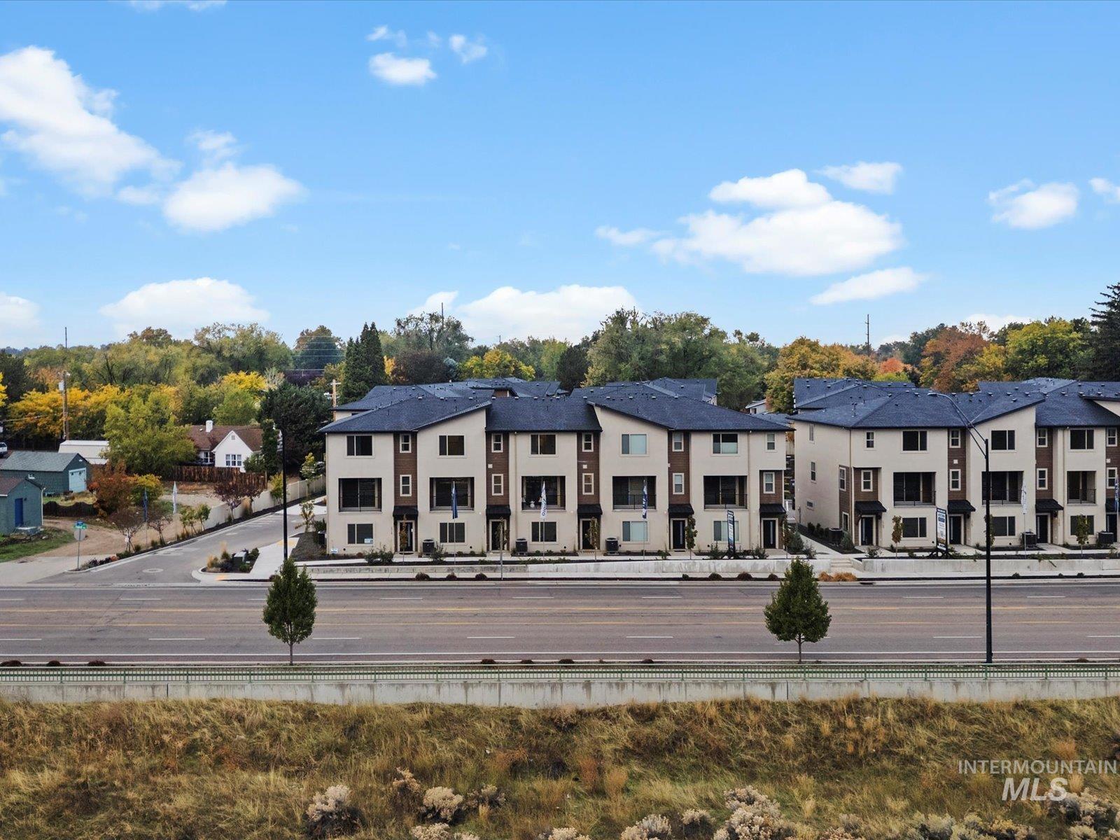 View of building exterior with a residential view