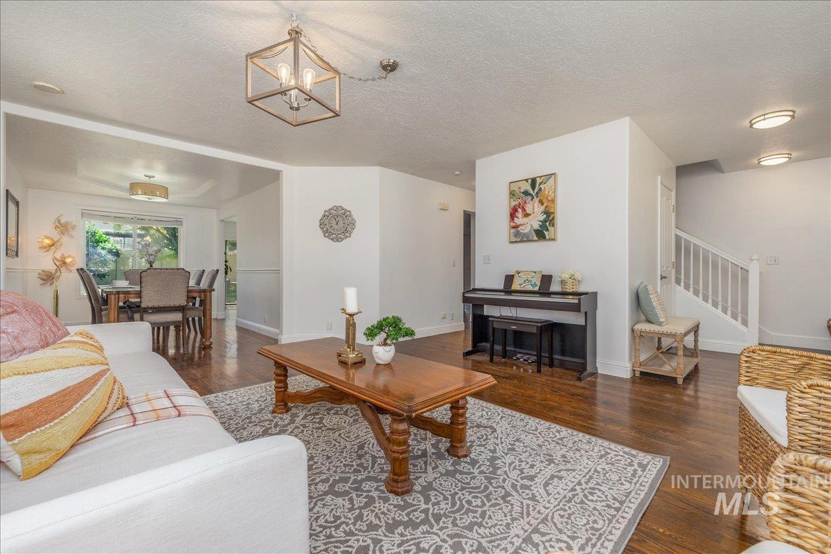 Spacious interior with dark wood-finish flooring throughout