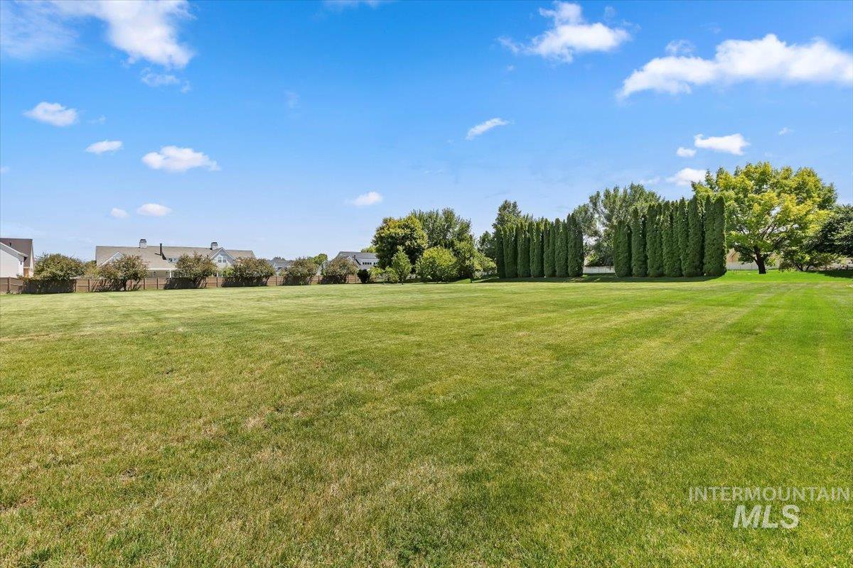 Expansive green lawn providing abundant open space