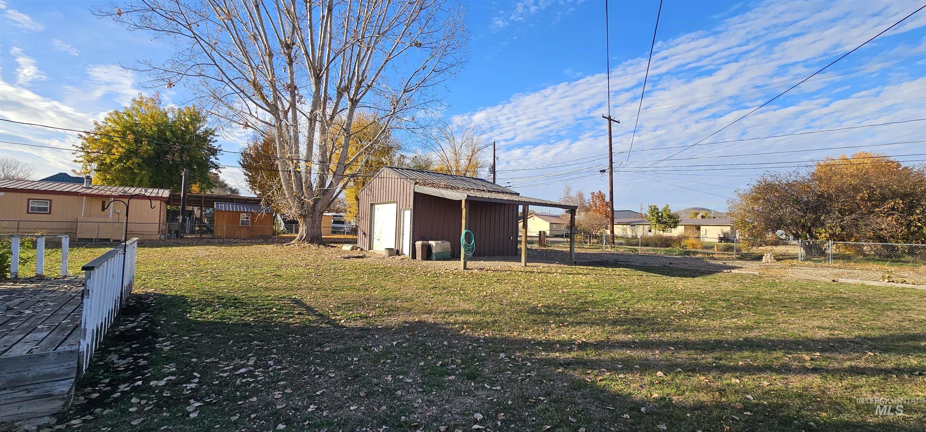 View of yard with an outdoor structure