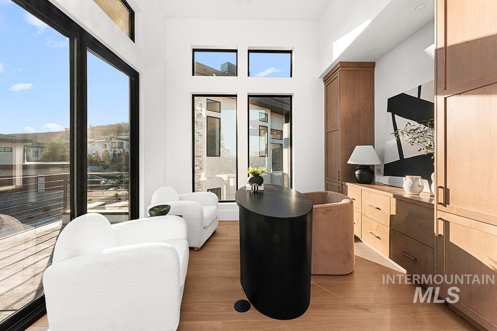 Dining space with light wood-style floors