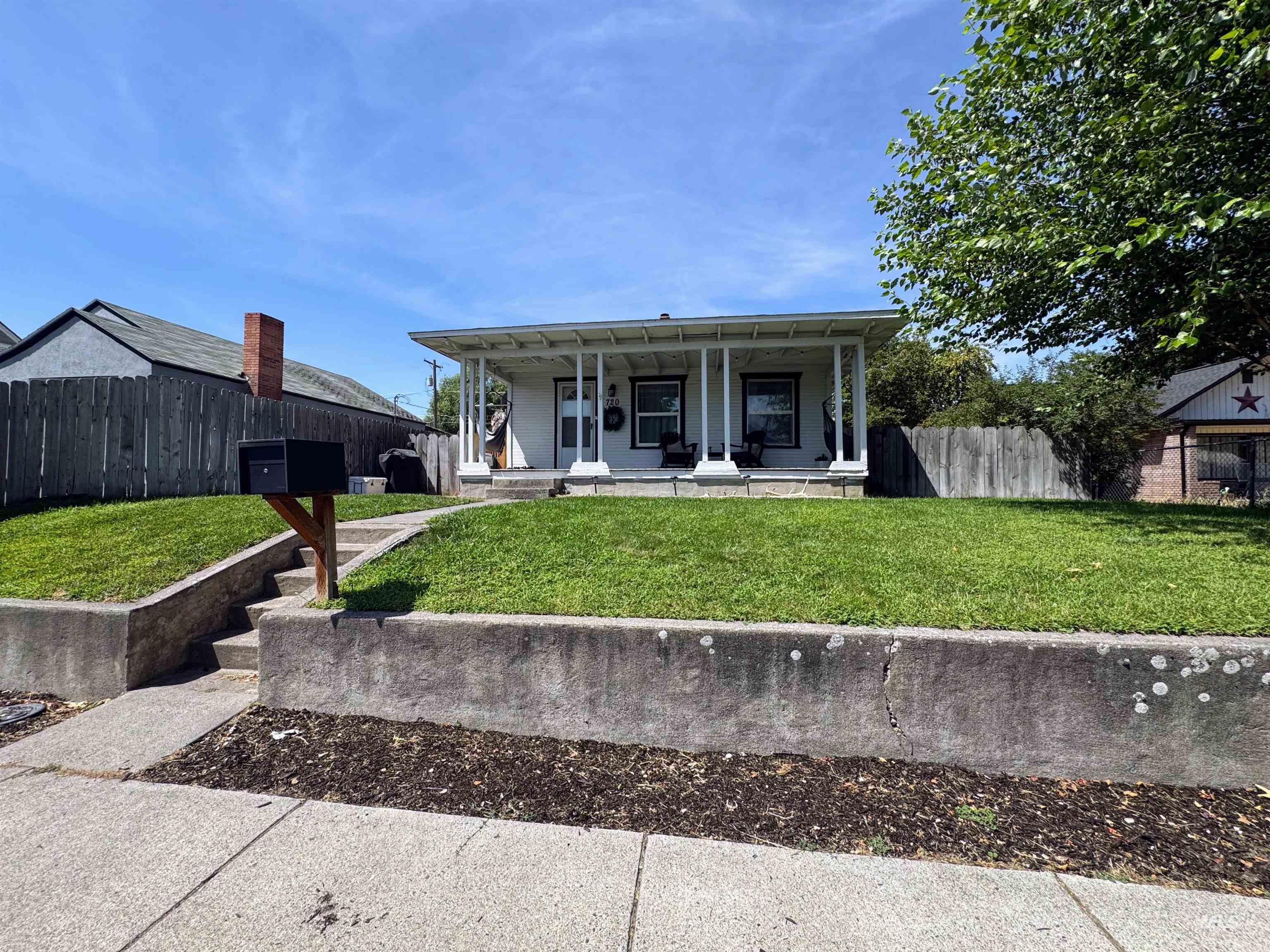 View of front of house with covered porch