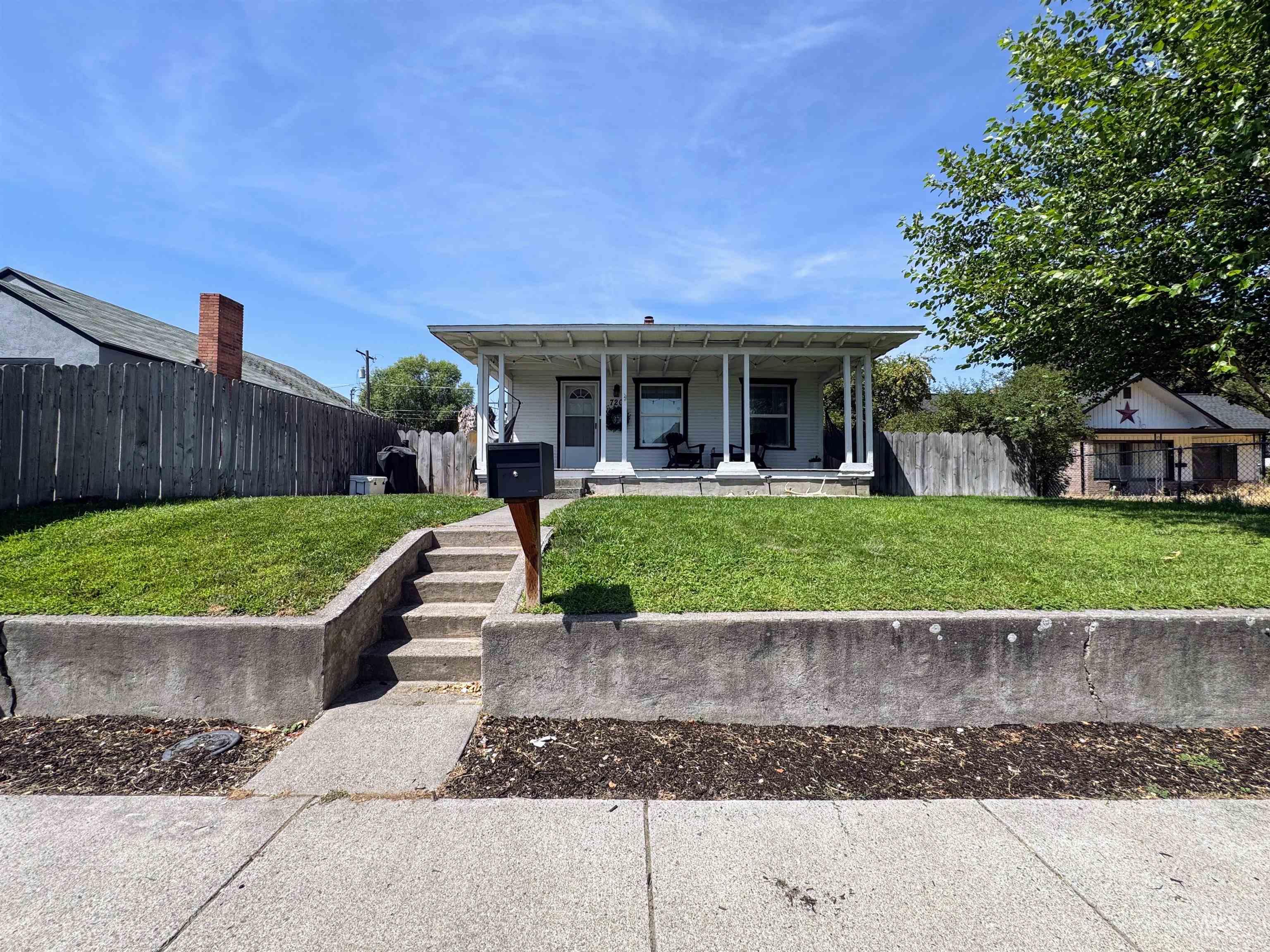View of front of property featuring a porch