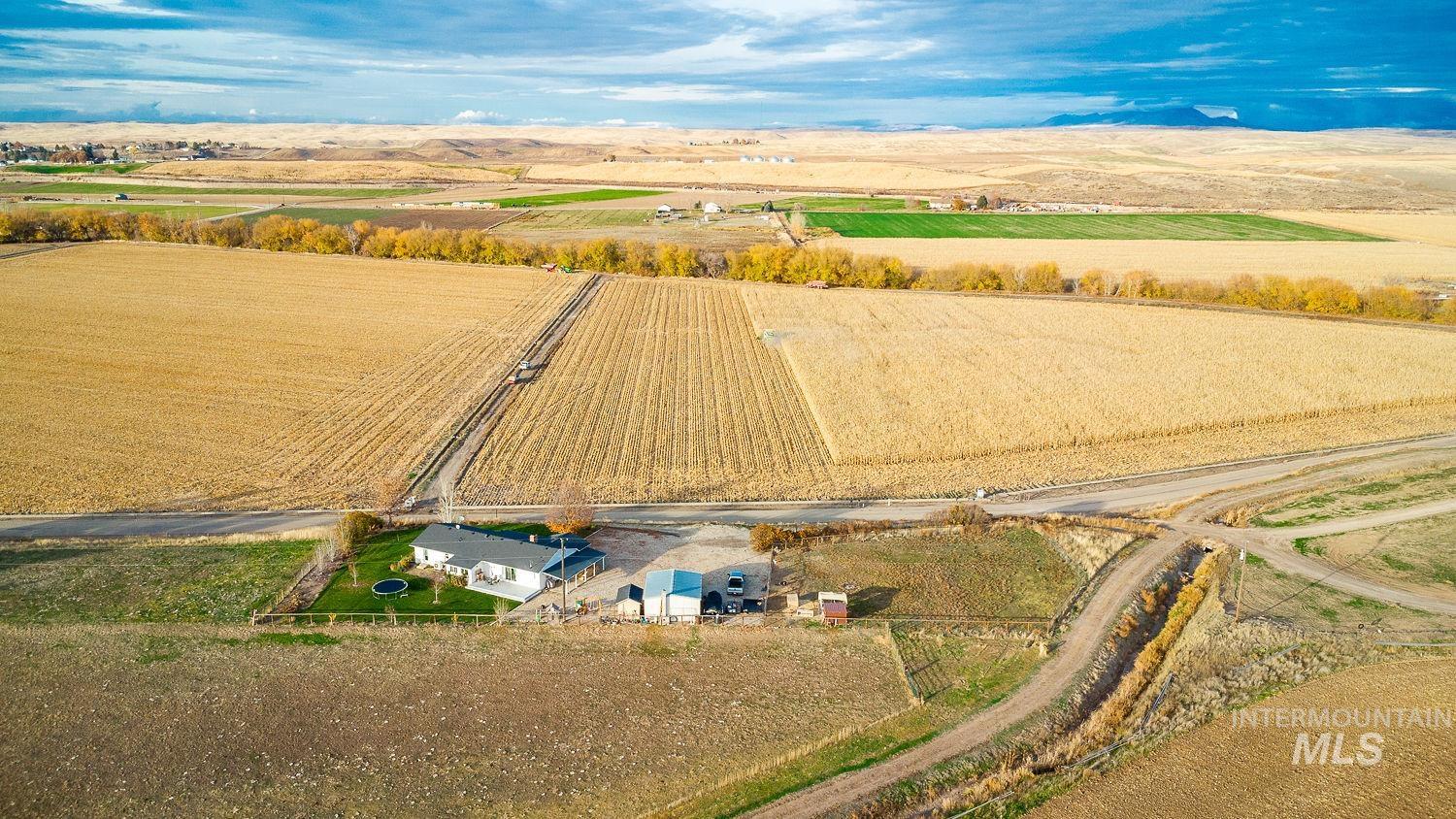 Aerial view of sparsely populated area with extensive farmland