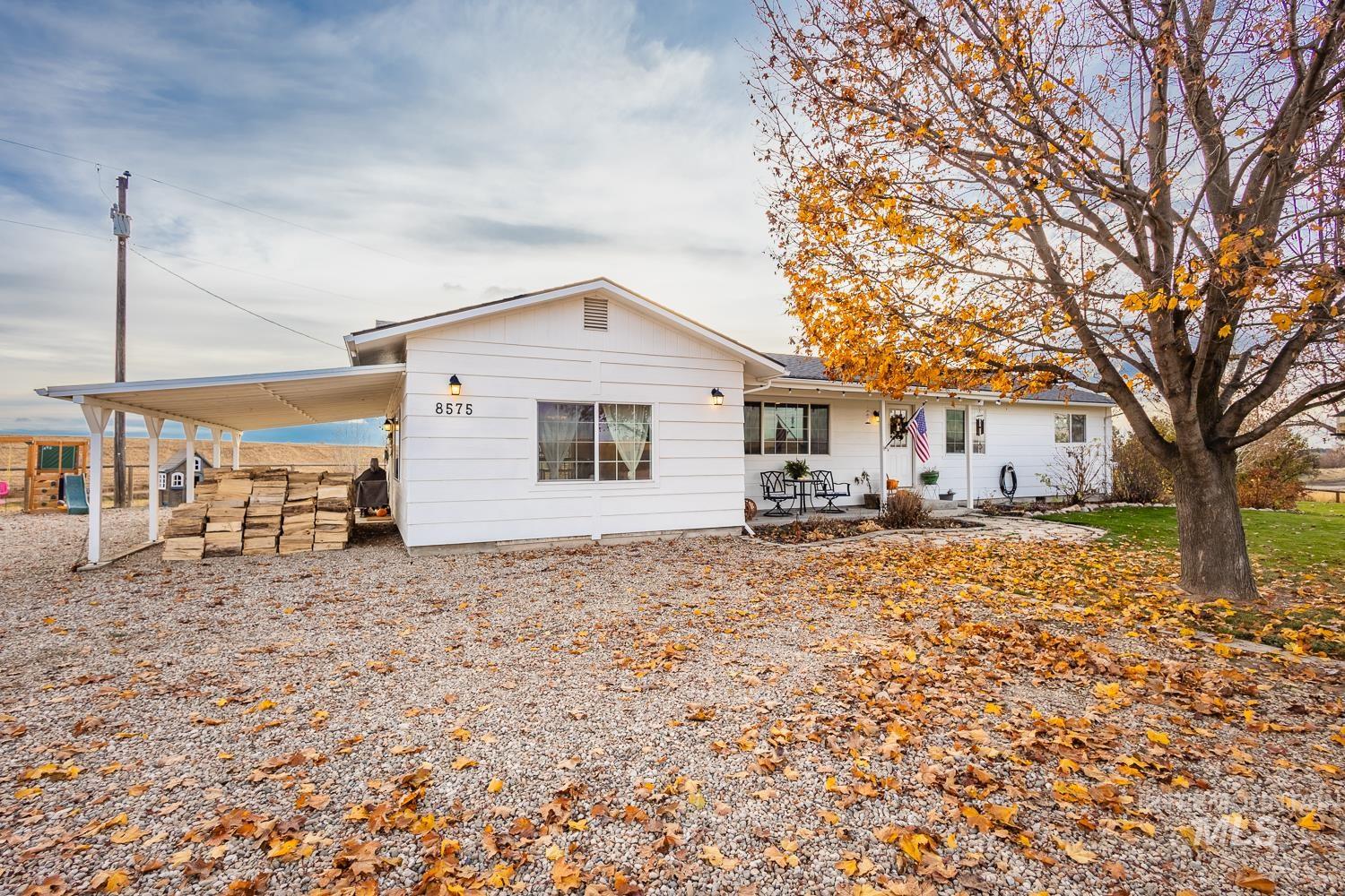 Rear view of property with a patio area