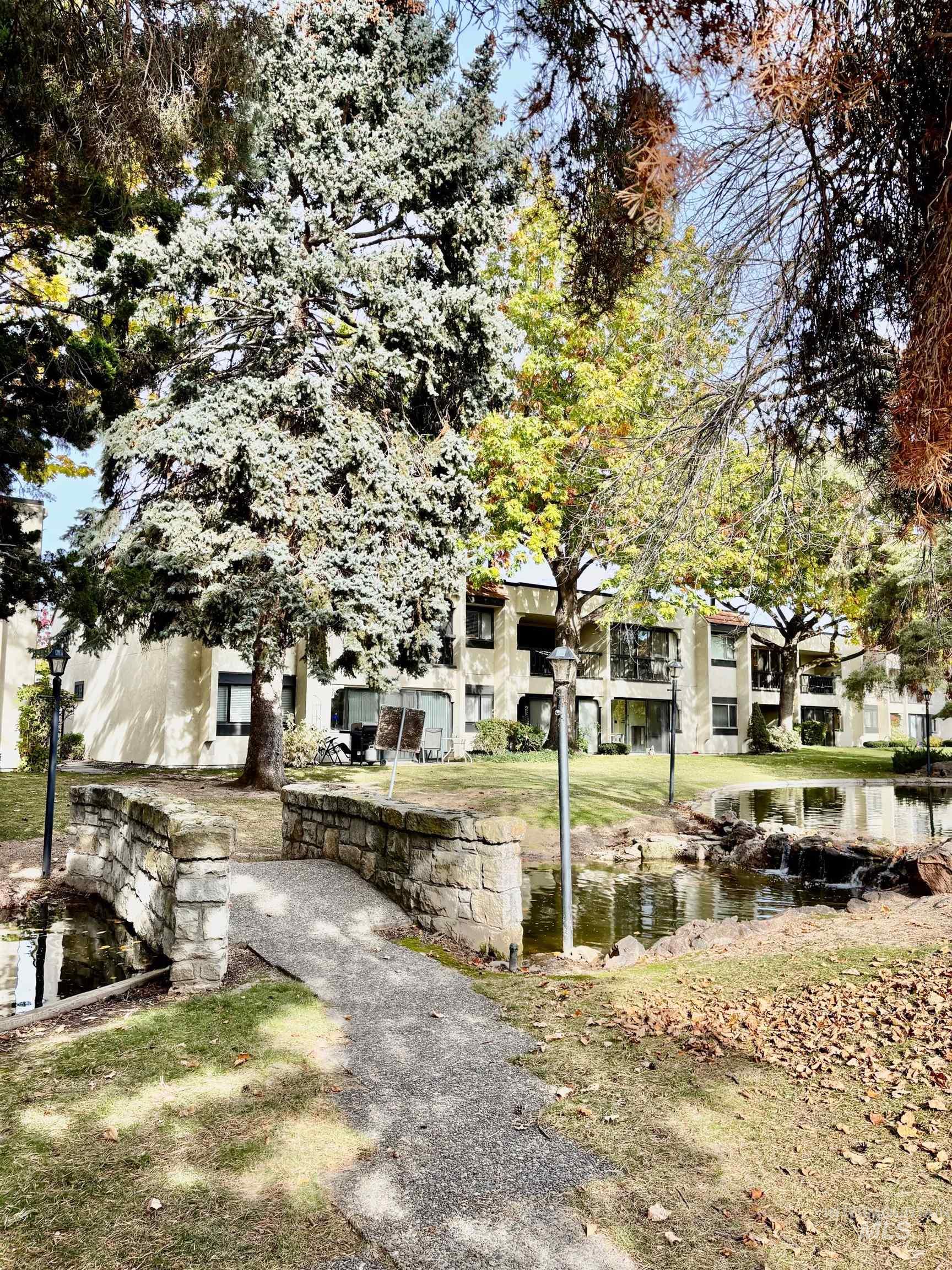 View of property's community with a water view