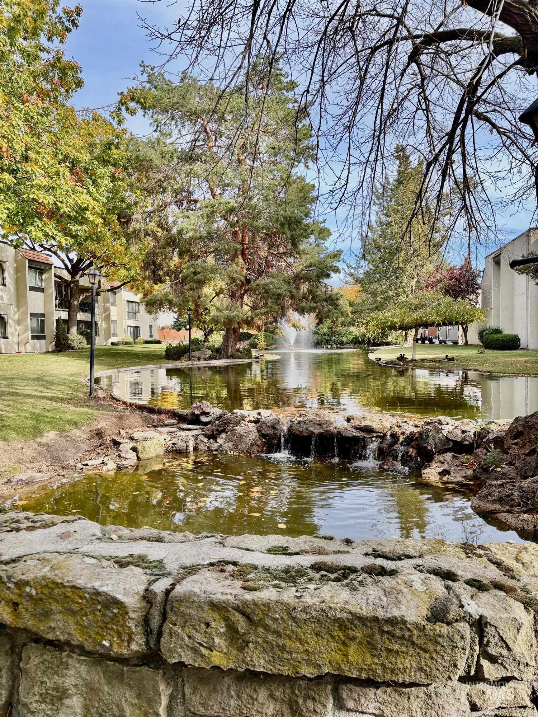 View of community with a water view