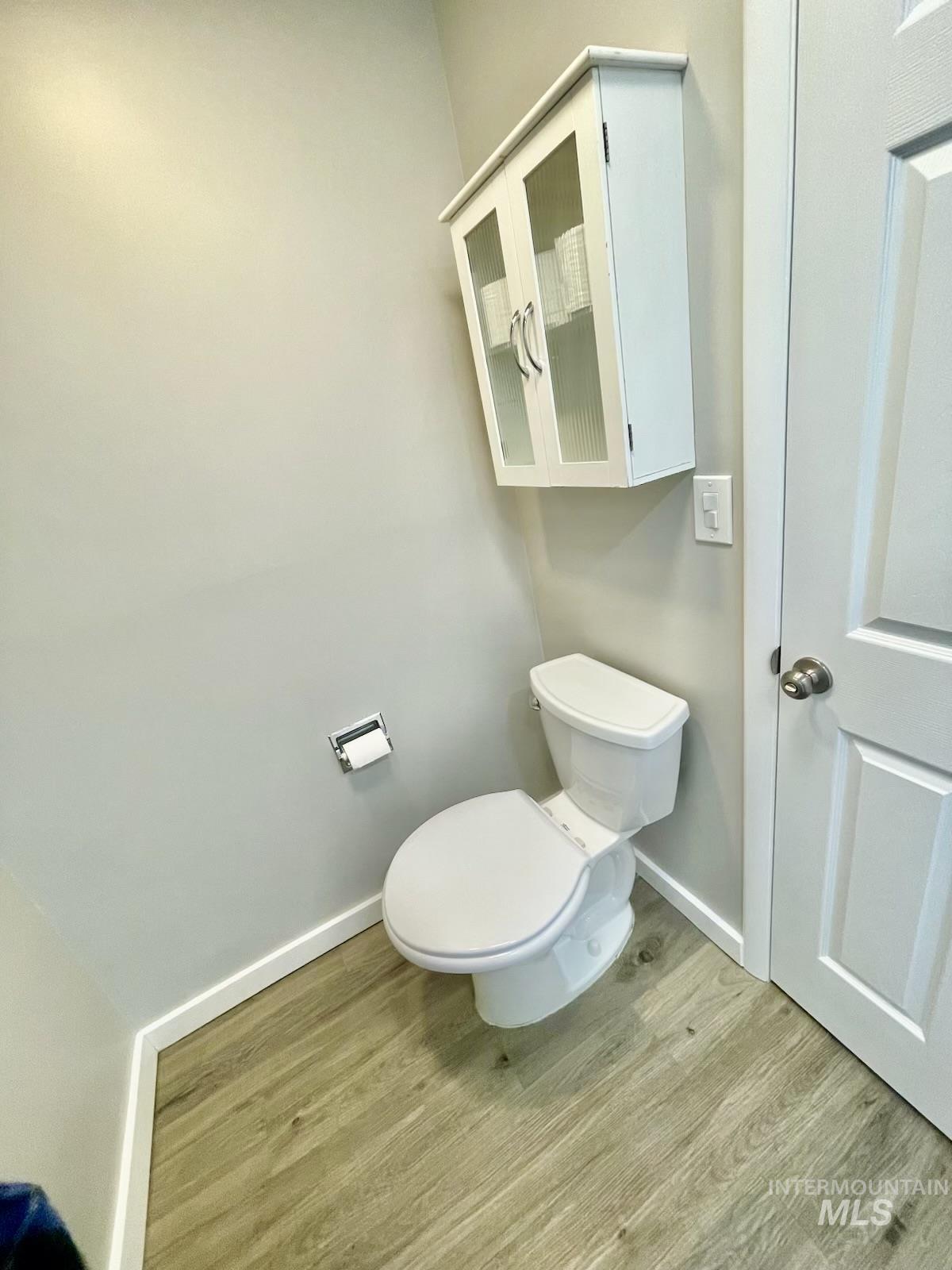 Bathroom with light wood-style flooring