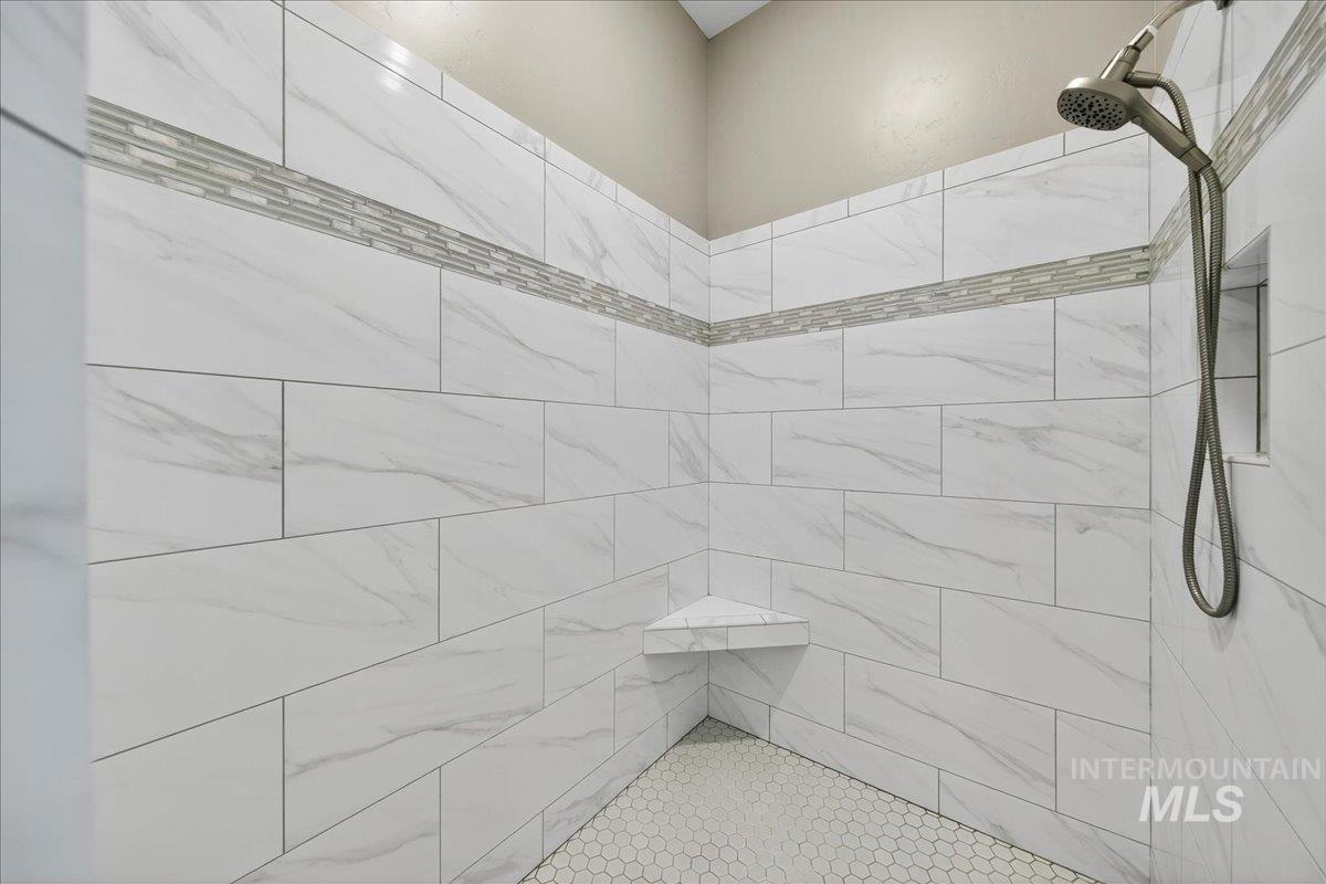 Bathroom with a tile shower