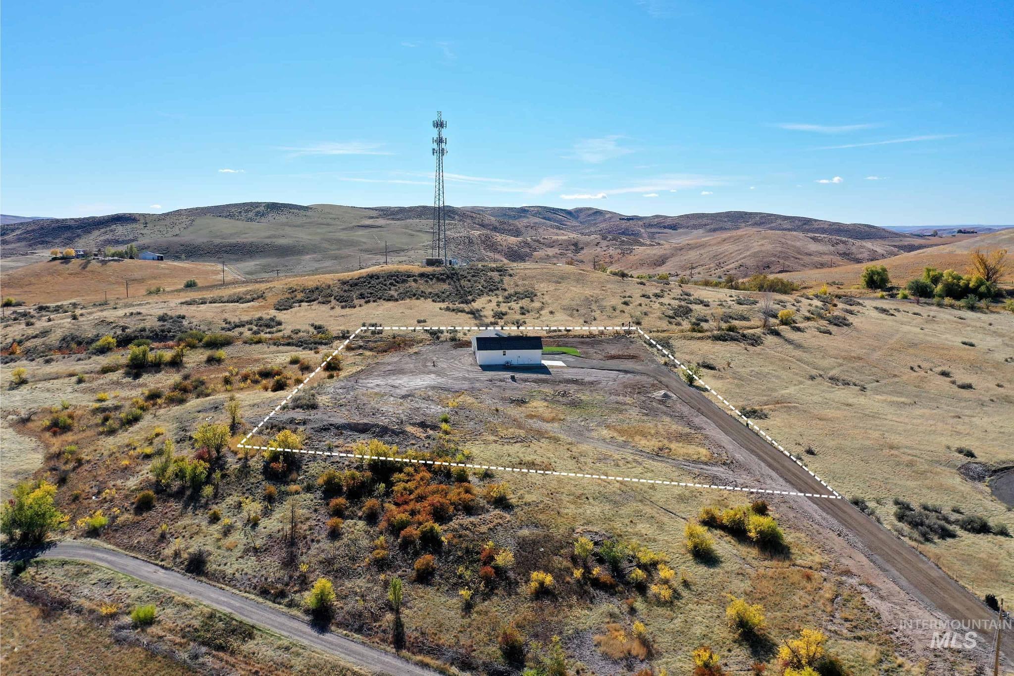 Overview of rural landscape with a mountainous background