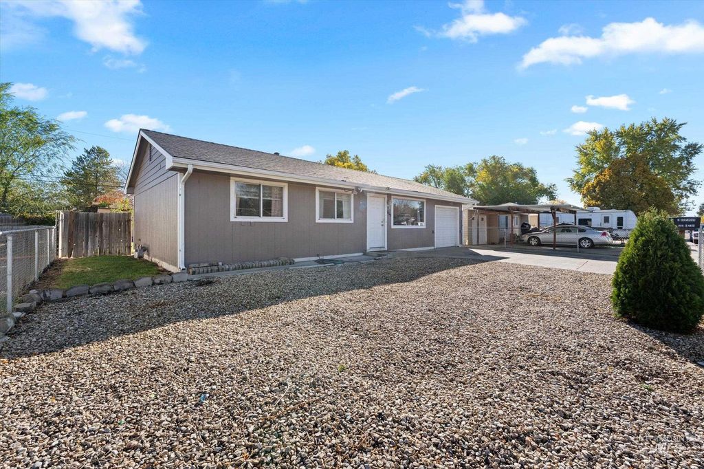 Photo of 735 S 12th E, Mountain Home, ID 83647 (MLS # 98966066)