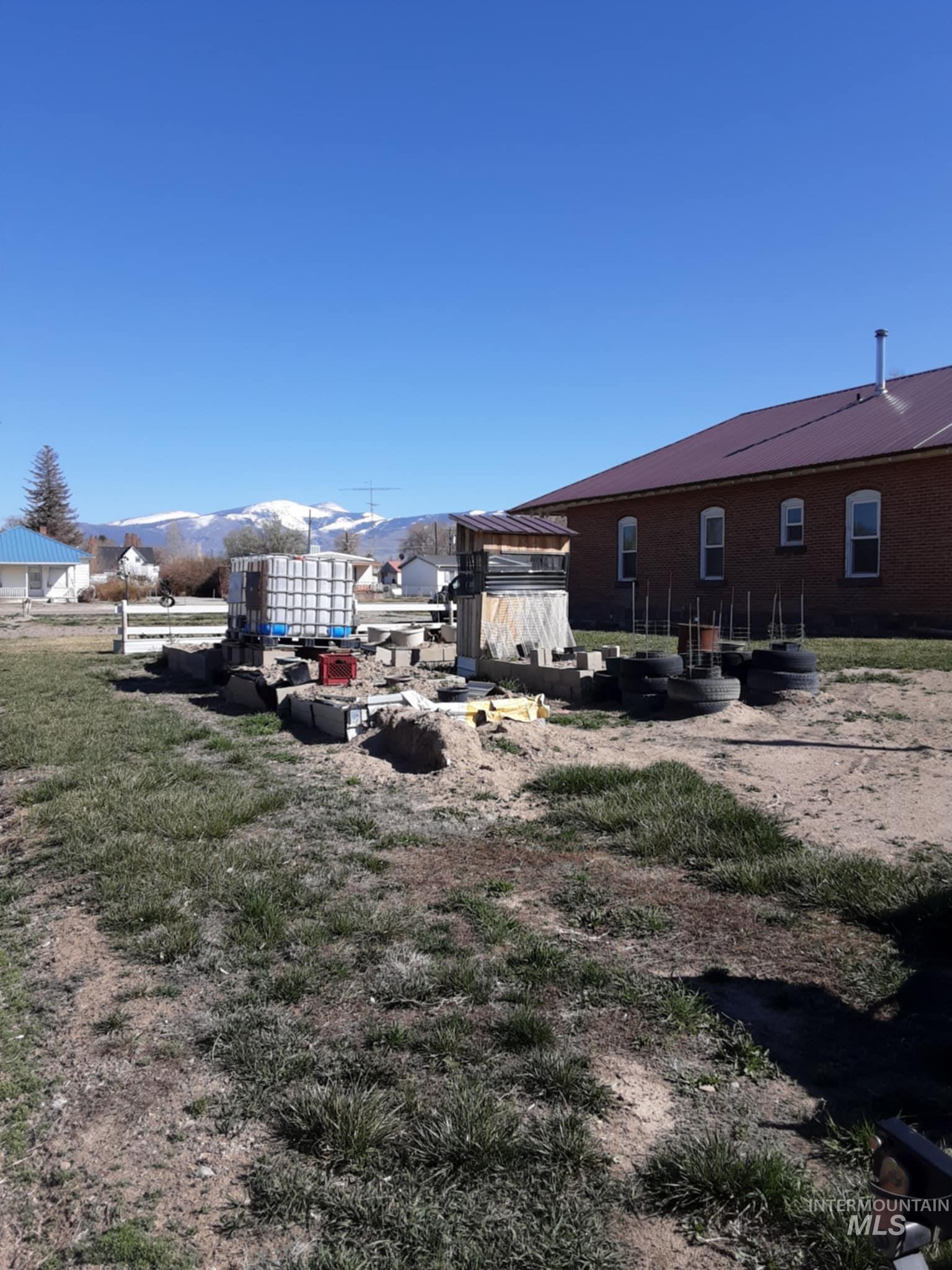 View of yard with a gazebo and a mountain view