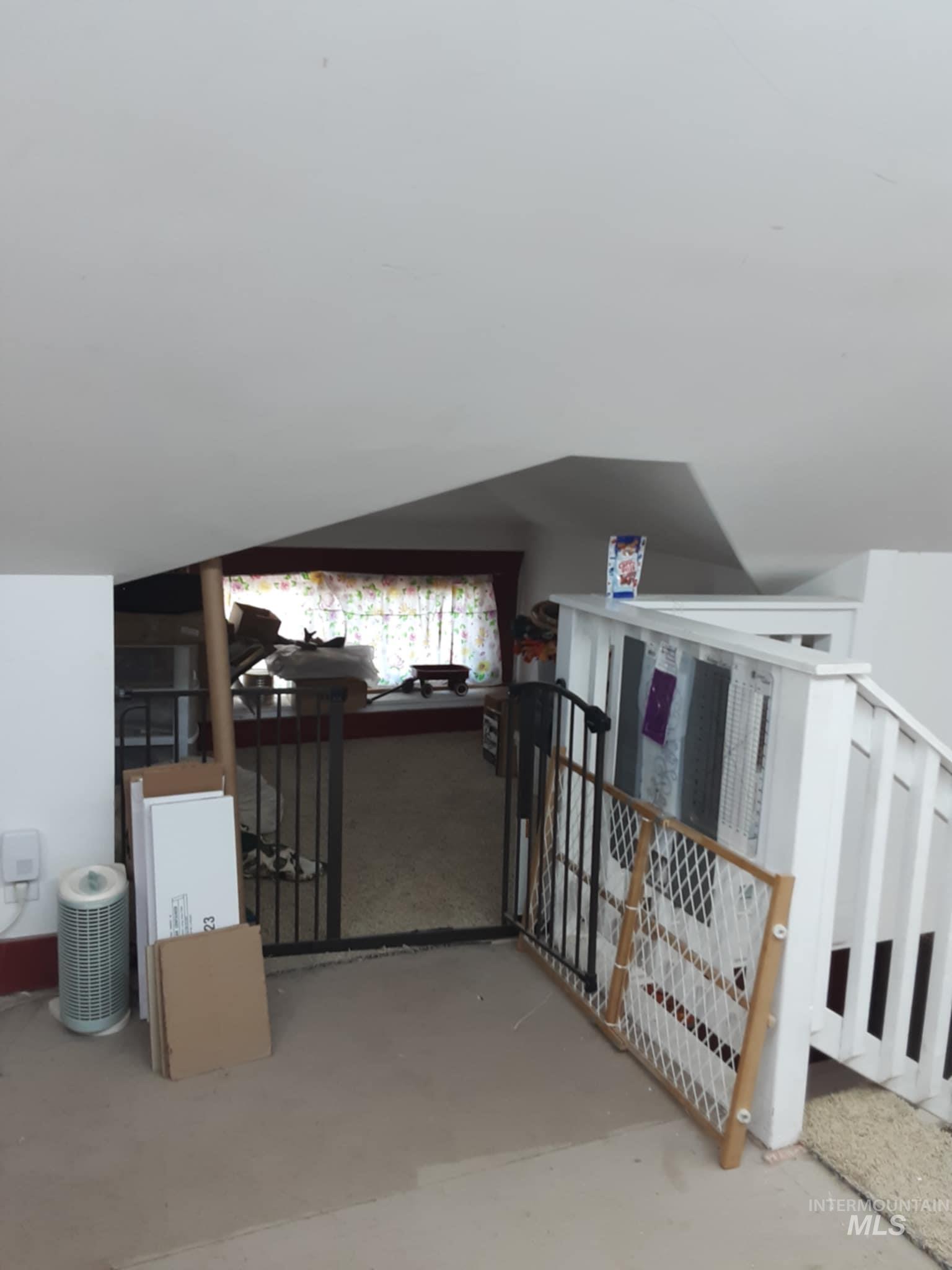 Bonus room featuring lofted ceiling